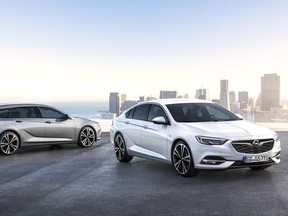 A Opel Insignia Grand Sport, right, and the Insignia Sports Tourer station wagon. The cars will be shown at the Geneva Auto Show in Geneva Switzerland that starts Tuesday March 7, 2017.