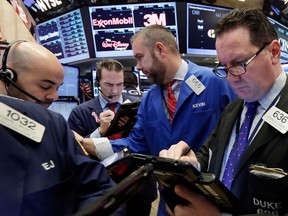Futures are flat after yesterday’s monster rally, but investors will have a lot to digest once that opening bell rings.