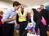 Canadian Prime Minister Justin Trudeau, greets new Syrian refugees at Pearson International airport in Toronto.
