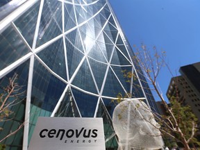 A Cenovus Energy sign is shown outside the Bow office tower in Calgary, Alta