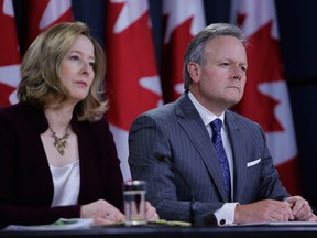 Stephen Poloz, governor of the Bank of Canada, right, and Carolyn Wilkins, senior deputy governor at the Bank of Canada, hold a news conference in Ottawa