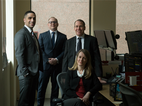 (Left to Right) Babak Assadi, Chris Dewey, Robert Wessel and Jennifer Mersereau (sitting), of Hamilton Capital