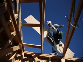 The Canada Mortgage and Housing Corp. says the seasonally adjusted annual rate of housing starts for March came in at 253,720 units, up from 214,253 in February.