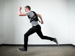 Graham Plant, Customer Experience and Outreach Coordinator demonstrates the SubPac at the Toronto offices