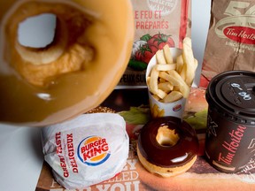 Sales at Tim Hortons and Burger King slipped in their home markets.