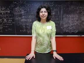 Doina Precup, associate professor in computer sciences does most of her research at a chalkboard outside her office at McGill University