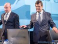 Bombardier's chief executive Alain Bellemare, left, and chairman Pierre Beaudoin arrive at the company's annual meeting Thursday in Montreal.