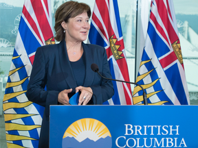 British Columbia Premier Christy Clark addresses the media at her office in Vancouver