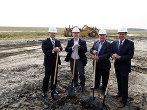 Walton's exceutive vice-president Craig Dickie, Walton CEO Bill Doherty, Ward 3 city of Calgary Councillor Jim Stevenson, John Plastiras, executive vice-president, Real Estate for Walton Global Investments at the ceremonial ground breaking for Cornerstone.