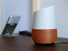 Google Home, right, sits on display near a Pixel phone following a product event in San Francisco.