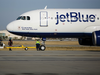 Ground operations crews ready a JetBlue Airways Corp. Airbus