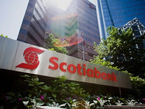 Scotiabank, Canada's third-biggest lender, reported net income of $2.1 billion, compared with $1.6 billion a year earlier.