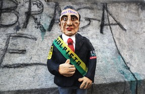 A doll portraying President Michel Temer is displayed at a protest against the government's proposed pension reforms and other austerity measures on May 1, 2017 in Rio de Janeiro, Brazil.