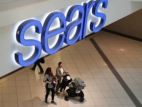 People shop at a Sears store on March 22, 2017 in Schaumburg, Illinois.