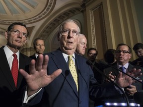 Senate Majority Leader Mitch McConnell, R-Ky., joined by, from left, Sen. John Barrasso, R-Wyo., Sen. John Thune, R-S.D., and Majority Whip John Cornyn, R-Texas, speaks following a closed-door strategy session, at the Capitol in Washington, Tuesday, June 20, 2017. Sen. McConnell says Republicans will have a "discussion draft" of a GOP-only bill scuttling former President Barack Obama's health care law by Thursday. (AP Photo/J. Scott Applewhite)