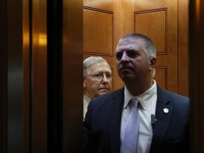 Senate Majority Leader Mitch McConnell of Ky., looks out after boarding an elevator Capitol Hill in Washington, Monday, June 26, 2017. Senate Republicans unveil a revised health care bill in hopes of securing support from wavering GOP lawmakers, including one who calls the drive to whip his party's bill through the Senate this week "a little offensive." (AP Photo/Carolyn Kaster)