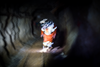 Underground, workers must look down most of the time to light up their path, which can be filled with jutting rocks and mucky debris. However, at Dome it’s also important to look up once in awhile because the old mine’s ceilings are also low and could have falling rocks.