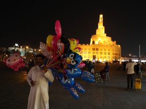 A Qatari man sell balloons at the popular Souq Waqif market, in the Qatari capital, Doha. Saudi Arabia, Egypt, the U.A.E. and Bahrain announced on June 5 they were cutting diplomatic ties and closing air, sea and land links with Qatar.