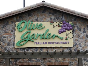 This Monday, June 27, 2016, photo shows an Olive Garden restaurant, a Darden brand, in Methuen, Mass. Darden Restaurants, Inc. reports earnings, Tuesday, June 27, 2017. (AP Photo/Elise Amendola)