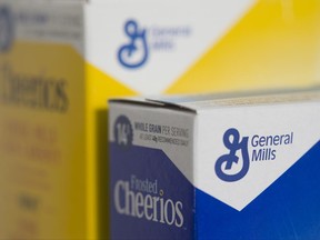 In this Friday, April 21, 2017, photo, boxes of General Mills' Cheerios cereal are arranged for a photo in Surfside, Fla. General Mills Inc. reports earnings, Wednesday, June 28, 2017. (AP Photo/Wilfredo Lee)