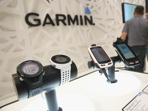GPS devices designed for golfers lie on display at the Garmin stand at the 2014 IFA home electronics and appliances trade fair on September 5, 2014