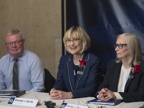 Alan R. Hibben, Director of Home Capital Group Inc., Brenda J. Eprile, chair of the board and Bonita J. Then, Interim President & Chief Executive Officer, speak  at an AGM press conference.