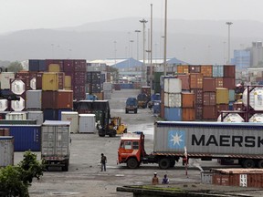 Containers are piled up at a terminal at the Jawaharlal Nehru Port Trust in Mumbai, India, Thursday, June 29, 2017. Operations at a terminal at India's busiest container port have been stalled by the malicious software that suddenly burst across the world's computer screens Tuesday, another example of the disruption that continues to be felt globally. (AP Photo/Rajanish Kakade)