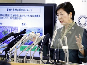 Tokyo Gov. Yuriko Koike speaks during a press conference at Tokyo Metropolitan City Hall in Tokyo Tuesday, June 20, 2017. Koike said the giant Tsukiji fish market, popular with tourists, will stay, although it will get modernized and developed within five years. Koike told reporters that the market will temporarily move to Toyosu, which required a 600 billion yen ($6 billion) investment. (Yohei Fukai/Kyodo News via AP)