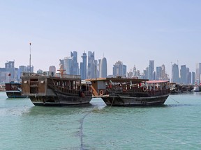 A general view taken on June 5, 2017 shows boats sitting in the port along the corniche in Doha.  Arab nations including Saudi Arabia and Egypt cut ties with Qatar, accusing it of supporting extremism, in the biggest diplomatic crisis to hit the region in years.