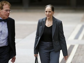 Renee Tartaglione leaves the federal courthouse in Philadelphia, Friday, June 23, 2017. Tartaglione, a member of a politically connected Philadelphia family, has been convicted of defrauding a nonprofit mental health clinic out of about $1 million for her personal benefit. A U.S. District Court jury convicted Tartaglione Friday on all counts of conspiracy, theft, fraud and tax evasion. (David Maialetti /The Philadelphia Inquirer via AP)