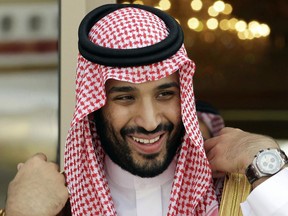 FILE - In this May 14, 2012 file photo, Prince Mohammed bin Salman waits for Gulf Arab leaders ahead of the opening of Gulf Cooperation Council summit, in Riyadh, Saudi Arabia.Saudi Arabia's King Salman has appointed his 31-year-old son Mohammed bin Salman as crown prince, removing the country's counterterrorism czar and a figure well-known to Washington from the royal line of succession. In a series of royal decrees issued Wednesday, June 21, 2017 and carried on the state-run Saudi Press Agency, the monarch stripped Prince Mohammed bin Nayef, who was first in line to the throne, from his title as crown prince and from his post as the country's powerful interior minister overseeing security. (AP Photo/Hassan Ammar, File)