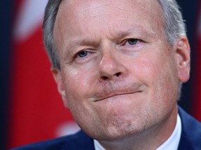 Bank of Canada governor Stephen Poloz talks about the Financial System Review at a press conference Thursday.