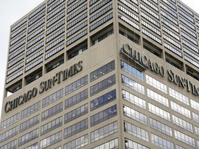 The building housing the Chicago Sun Times is seen Monday, June 19, 2017, in Chicago. An investor group led by former Alderman Edwin Eisendrath and the Chicago Federation of Labor, an umbrella group of labor unions, submitted a bid to purchase the Chicago Sun-Times on Monday by a 5 p.m. deadline. (AP Photo/G-Jun Yam)