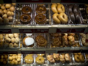 Doughnuts sit on display at a Tim Hortons restaurant in Oakville.
