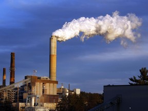 A plume of steam billows from the coal-fired Merrimack Station in Bow, N.H. President Donald Trump may abandon U.S. pledges to reduce carbon emissions, but global economic realities ensure he is unlikely to reverse the accelerating push to adopt cleaner forms of energy
