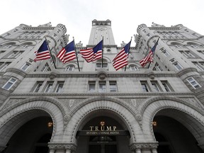 FILE - The Trump International Hotel at 1100 Pennsylvania Avenue NW, is seen Wednesday, Dec. 21, 2016 in Washington.   President Donald Trump keeps taking time out from governing to run for re-election.  On Wednesday night, he'll attend his first 2020 campaign fundraiser, at his Washington hotel. He's already spent five evenings at political rallies, always in front of an audience of thousands of fans who are selected by his campaign aides.  (AP Photo/Alex Brandon)