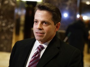 FILE - In this Jan. 13, 2017 file photo, Anthony Scaramucci, a senior adviser to President-elect Donald Trump, talks to reporters in the lobby of Trump Tower in New York. CNN isn't commenting Monday, June 26, as to what led it to retract a story about a supposed investigation into a pre-inaugural meeting between an associate of Trump and the head of a Russian investment fund. The story posted Thursday on CNN's website said Senate investigators are looking into the meeting between Scaramucci and Kirill Dmitriev, whose Russian Direct Investment Fund guides investments by U.S. entities in Russia. Scaramucci, in the story, said he exchanged pleasantries in a restaurant with Dmitriev. (AP Photo/Evan Vucci, File)