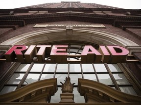 FILE - This Friday, Oct. 21, 2016, file photo, shows a Rite Aid location in Philadelphia. Walgreens ended its takeover pursuit of rival Rite Aid following resistance from U.S. regulators and will instead now buy stores, distribution centers and inventory in a new deal. (AP Photo/Matt Rourke, File)