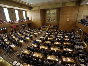 FILE - In this Jan. 9, 2017 file photo, Oregon Gov. Kate Brown delivers her inaugural speech to Oregon legislators in the Capitol House chambers in Salem, Ore. Insurance companies in Oregon would be required to cover abortions and a variety of other reproductive services at no cost to the patient under a $10 million reproductive health bill approved by the state Legislature. House Bill 3391 was approved by the Oregon Senate, Wednesday, July 5, 2017, in a 17-13 vote along party lines and now heads to Gov. Brown. (AP Photo/Don Ryan, File)