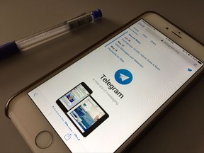 The messaging app Telegram is displayed on a smartphone, Saturday, July 15, 2017, in Bangkok, Thailand. Indonesia says it's blocking web versions of the Telegram instant messaging app and will block the app completely if it continues to be a forum for radical propaganda and violent militants. (AP Photo)