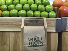 In this Saturday, July 15, 2017, photo, fruit is stacked in bins in the produce section of the Whole Foods Market in Sudbury, Mass. Whole Foods Market Inc. reports earnings, Wednesday, July 26, 2017. (AP Photo/Bill Sikes)