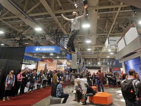 FILE - In this Jan. 11, 2017, file photo, people attend the Outdoor Retailer show at the Salt Palace Convention Center in Salt Lake City. Organizers announced Thursday, July 6, 2017, that the show will be held in Denver starting in 2018. The retailers are leaving Utah after 20 years because of political differences with Utah leaders, including their opposition to the new Bears Ears National Monument.  (AP Photo/Rick Bowmer, File)