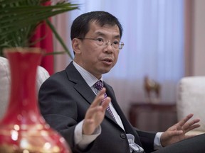 China's Ambassador to Canada Lu Shaye participates in an interview at the Embassy of the People's Republic of China in Canada, in Ottawa on Thursday, June 29, 2017. Shaye told The Canadian Press he doesn't think Chinese investors will want to endure what he described as lengthy regulatory processes required for Canadian infrastructure. THE CANADIAN PRESS/Justin Tang