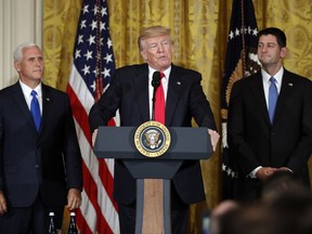 President Donald Trump, accompanied by Vice President Mike Pence, and House Speaker Paul Ryan of Wis., speaks in the East Room of the White House, Wednesday, July 26, 2017, in Washington. Trump is announcing the first U.S. assembly plant for electronics giant Foxconn in a project that's expected to result in billions of dollars in investment in the state and create thousands of jobs. (AP Photo/Alex Brandon)