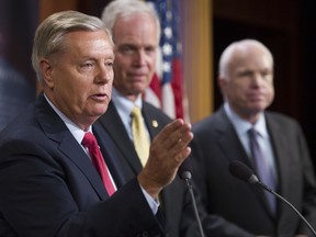 From left, Sen. Lindsey Graham, R-S.C., Sen. Ron Johnson, R-Wis., and Sen. John McCain, R-Ariz., speak to reporters at the Capitol as the Republican-controlled Senate unable to fulfill their political promise to repeal and replace "Obamacare" because of opposition and wavering within the GOP ranks, on Capitol Hill in Washington, Thursday, July 27, 2017. (AP Photo/Cliff Owen)