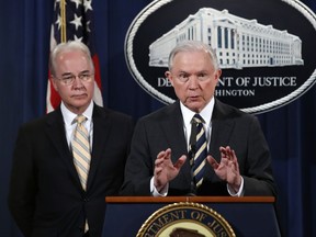 Attorney General Jeff Sessions, right, with Health and Human Services Secretary Tom Price, speaks about opioid addiction during a news conference, Thursday, July 13, 2017, at the Justice Department in Washington. (AP Photo/Jacquelyn Martin)