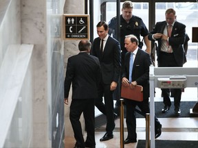White House senior adviser Jared Kushner, center, accompanied by his attorney Abbe Lowell, arrives on Capitol Hill in Washington, Monday, July 24, 2017, to meet behind closed doors before the Senate Intelligence Committee on the investigation into possible collusion between Russian officials and the Trump campaign. (AP Photo/Jacquelyn Martin)