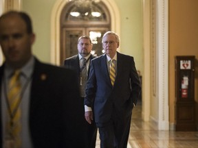 Senate Majority Leader Mitch McConnell of Ky. arrives on Capitol Hill in Washington, Thursday, July 13, 2017, where he is expected to present the GOP's revised health care bill and push toward a showdown vote next week with opposition within the Republican ranks. (AP Photo/J. Scott Applewhite)