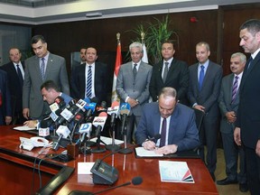 Bombardier Transportation representatives sign a memorandum of understanding with the Egyptian government to develop a plan for Cairo's new metro Line 6.