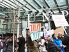 Protesters demonstrate in front of the Trump International Hotel and Tower in Vancouver during the hotel’s opening day on February 28, 2017.
